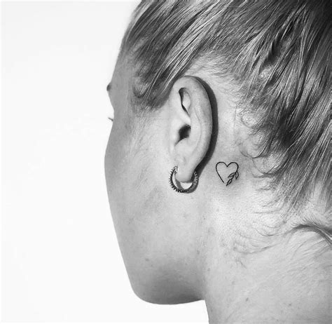 broken heart tattoo behind ear|Top 10 heart tattoos behind the ear ideas and inspiration